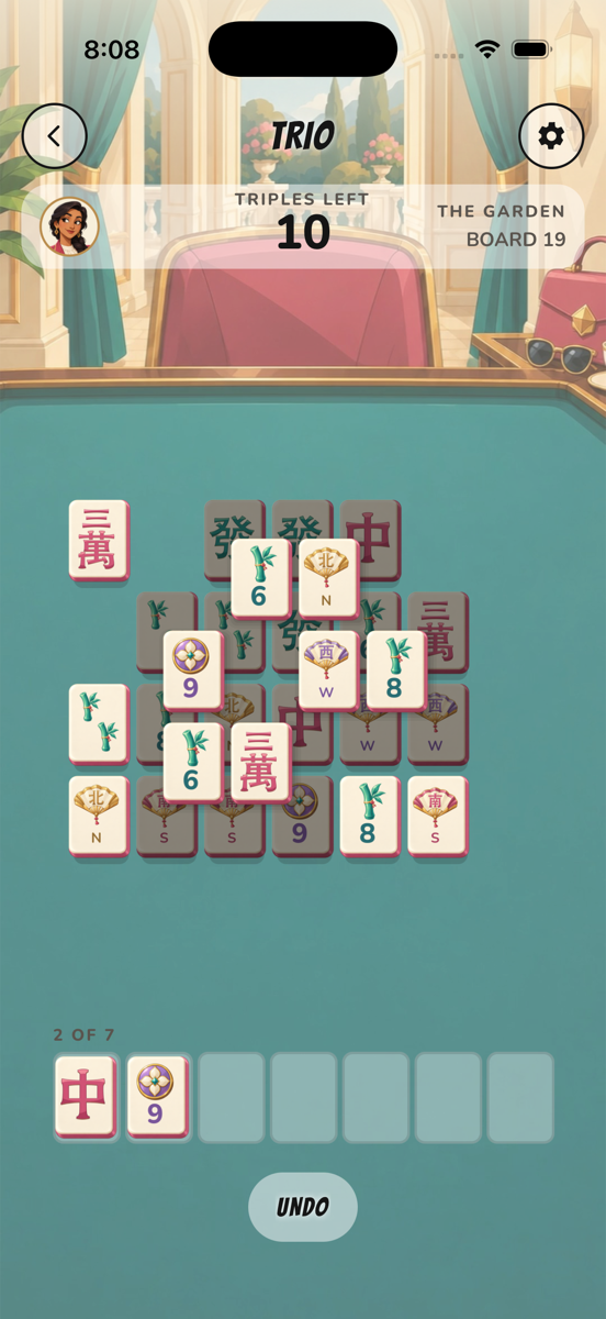 Trio gameplay with layered tiles and a seven-space tray